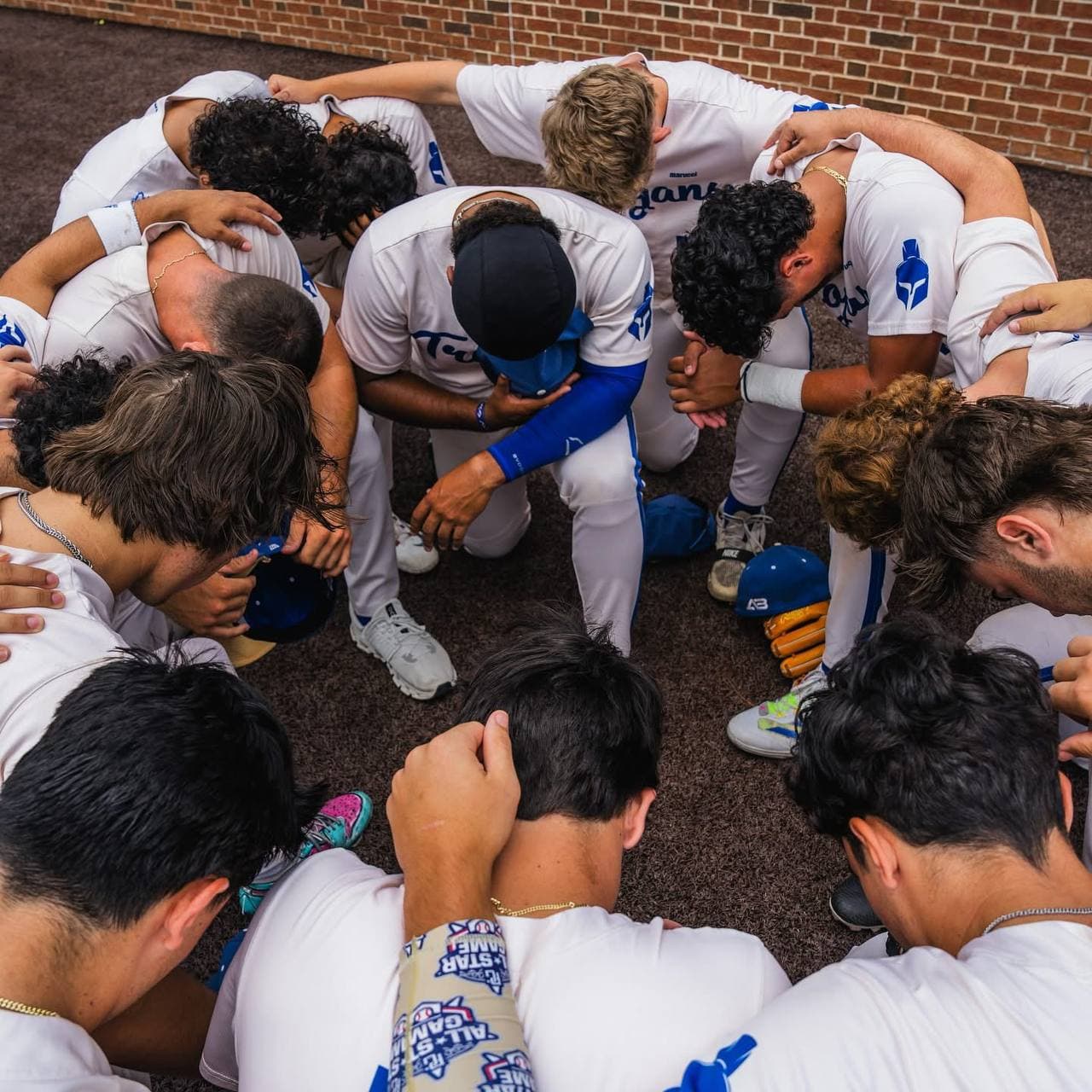 A3 players huddled together before a game