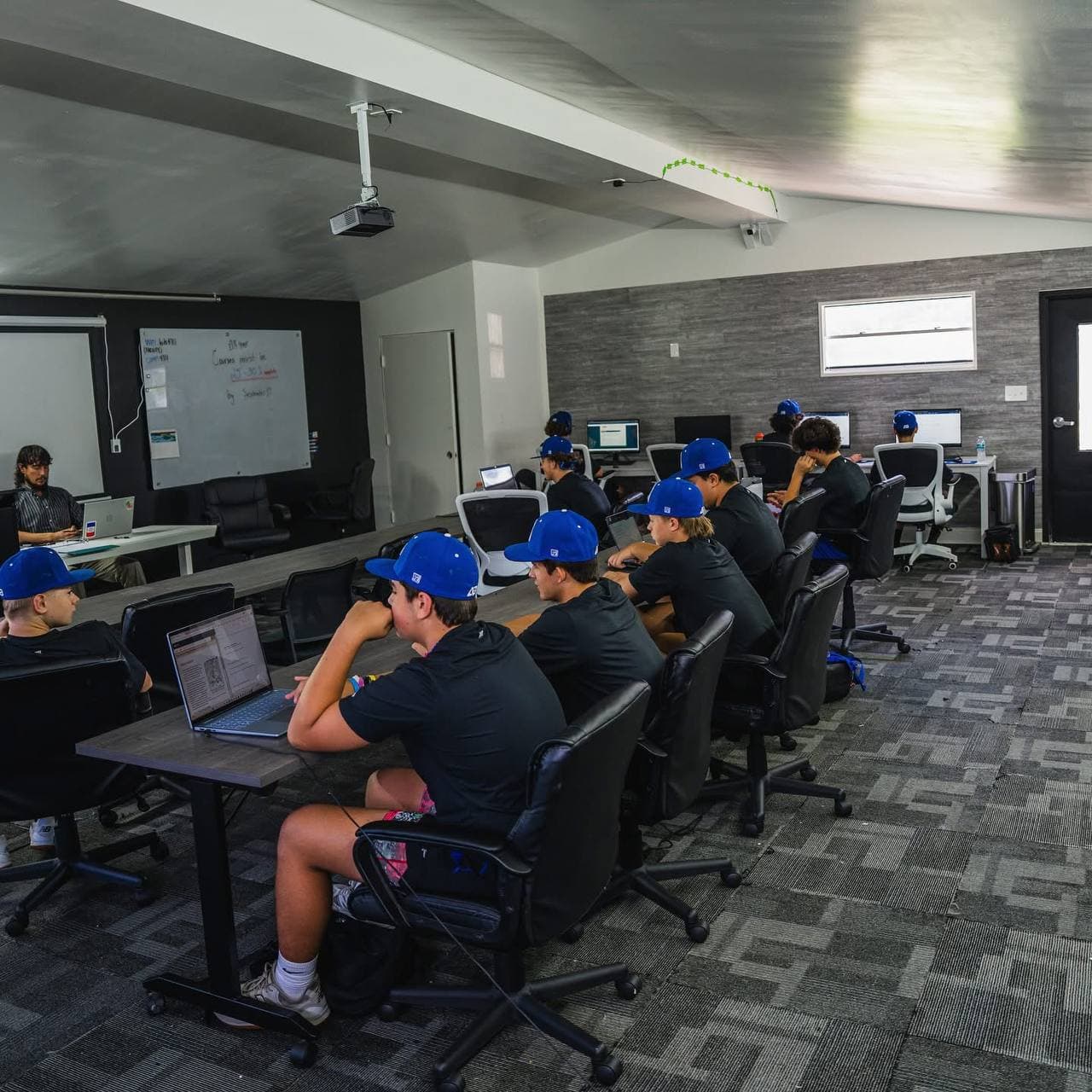 Players completing accredited coursework in the academy computer lab